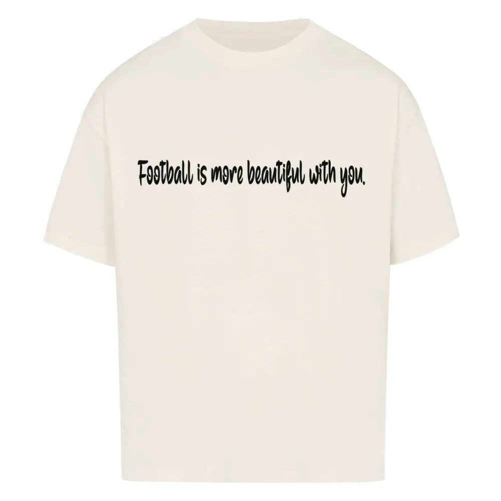 Football Oversized Shirt: Beiges Oversized-T-Shirt mit schwarzem Frontprint: „Football is more beautiful with you.“