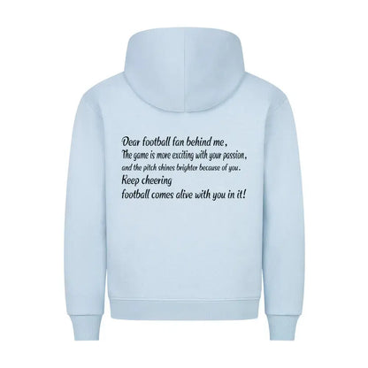 Fußball Hoodie: Babyblauer Hoodie mit weißem Frontprint „Football comes alive with you in it!“ und Rückentext an Fußballfans – emotionale Botschaft im Script-Stil