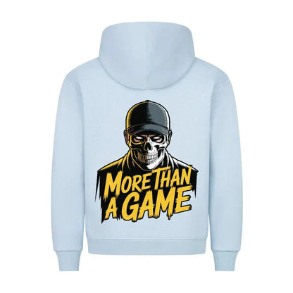 Fußball Pullover: Hellblauer Hoodie mit Rückenprint: Totenkopf mit Cap und Schriftzug „More Than A Game“ in gelb-schwarz