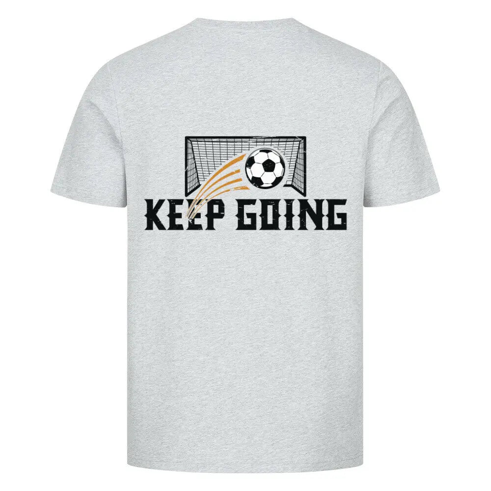 Premium Keep going Shirt: Graues T-Shirt mit Rückenprint „KEEP GOING“, Fußball fliegt mit gelben Bewegungslinien ins Tor – sportlicher Motivationslook